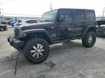  Salvage Jeep Wrangler